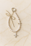 Pearl Phone Charm with Airplane & Bow Design